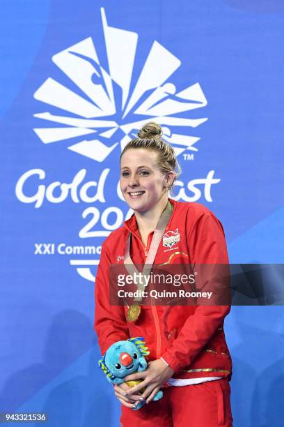 Gold medalist Siobhan Marie O'Connor of England poses during the medal ceremony for the Women's 200m Individual Medley Final on day four of the Gold...