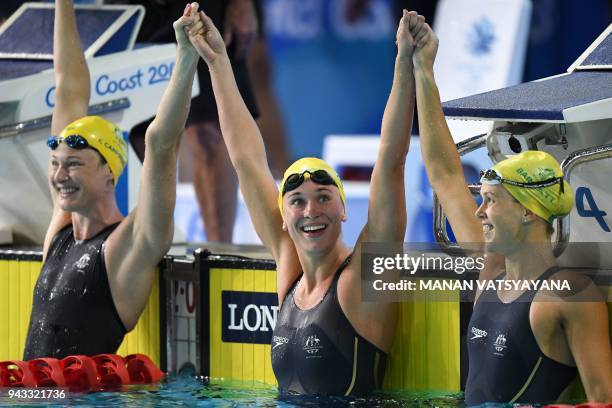 Australia 's Cate Campbell , Australia's Madeline Groves and Australia 's Holly Barratt celebrate after the swimming women's 50m butterfly final...