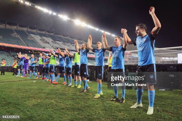 Sydney FC players celebrate their win infront of the Cove after the round 26 A-League match between Sydney FC and Adelaide United at Allianz Stadium...