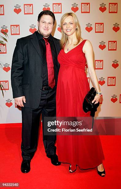 Matthias Steiner and girlfriend, tv host Inge Posmyk attend the 'Ein Herz fuer Kinder' Gala at Studio 20 at Adlershof on December 12, 2009 in Berlin,...