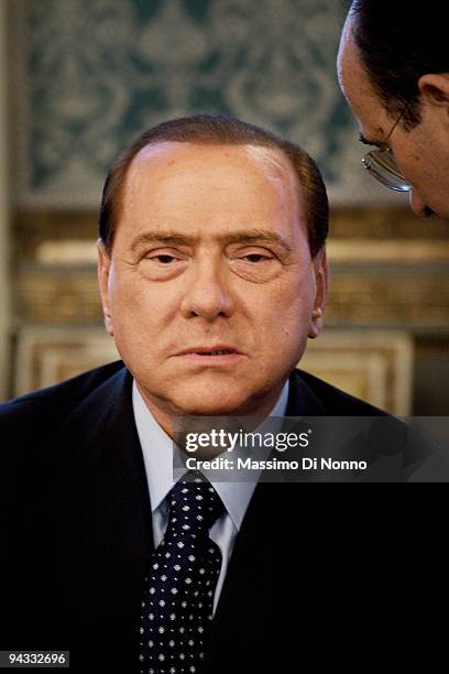 Italian Prime Minister Silvio Berlusconi looks on during the meeting with the Vietnamese President Nguyen Minh Triet on December 11, 2009 in Milan,...