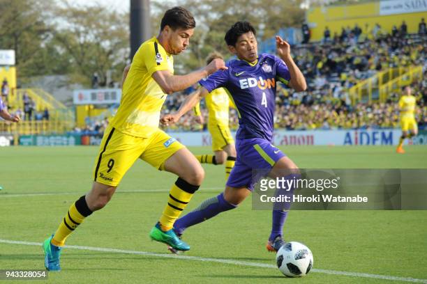 Cristiano of Kashiwa Reysol and Hiroki Mizumoto of Sanfrecce Hiroshima compete for the ball during the J.League J1 match between Kashiwa Reysol and...