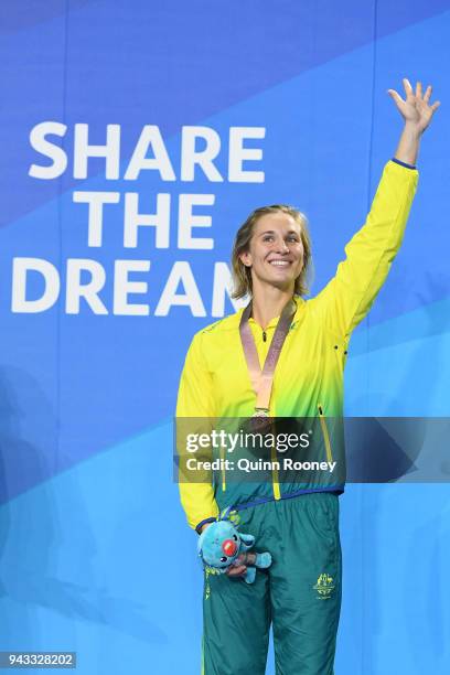 Bronze medalist Madeline Groves of Australia poses during the medal ceremony for the Women's 50m Butterfly Final on day four of the Gold Coast 2018...