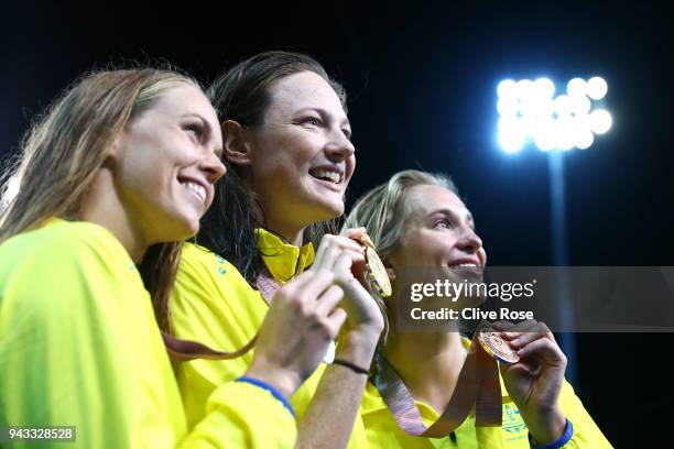 Silver medalist Holly Barratt of Australia, gold medalist Cate Campbell of Australia and bronze medalist Madeline Groves of Australia pose during the...