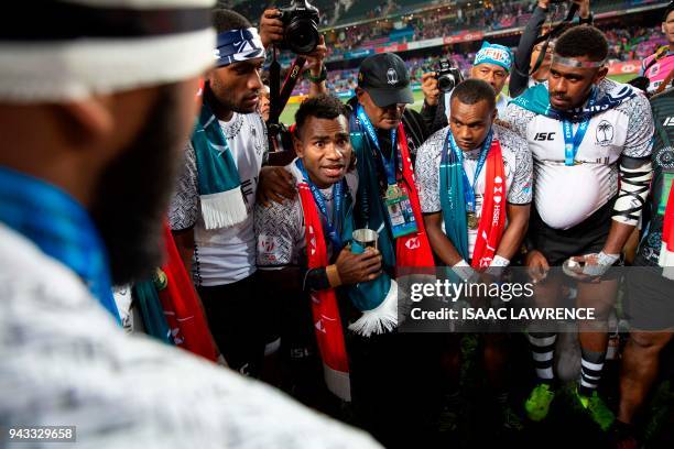 Captian Jerry Tuwai speaks to his team after Fiji beat Kenya in the Cup Final on the third day at the Hong Kong Sevens rugby tournament in Hong Kong...