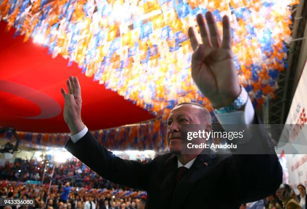President of Turkey and leader of Turkey's ruling Justice and Development Party Recep Tayyip Erdogan greets the crowd during AK Party's 6th ordinary...