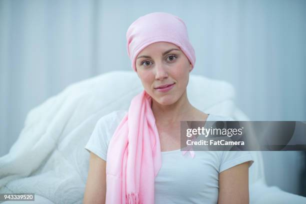 optimistic woman - cancer 2016 stock pictures, royalty-free photos & images