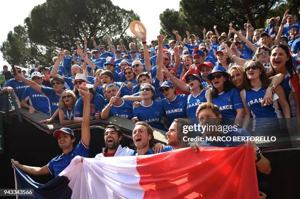 France's team players Pierre-Hugues Herbert, Jeremy Chardy, Lucas Pouille, Adrian Mannarino and Nicolas Mahut celebrate after winning the Davis Cup...