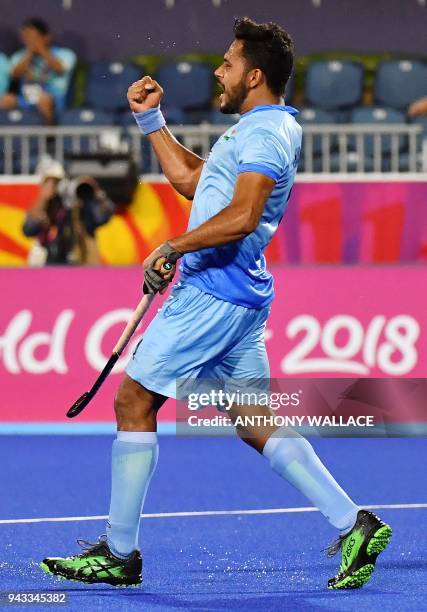 Harmanpreet Singh of India celebrates scoring a goal during the men's field hockey match between India and Wales at the 2018 Gold Coast Commonwealth...