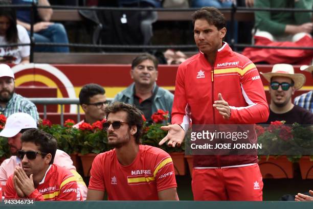 Spain's Rafa Nadal applauds during the Davis Cup quarter-final tennis match between Spain's David Ferrer and Germany's Philipp Kohlschreiber at the...