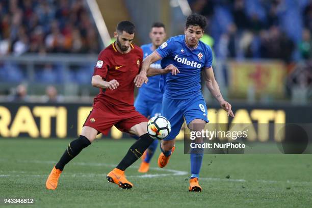 Roma v Fiorentina - Serie A Maxime Gonalons of Roma and Giovanni Simeone of Fiorentina at Olimpico Stadium in Rome, Italy on April 7, 2018.