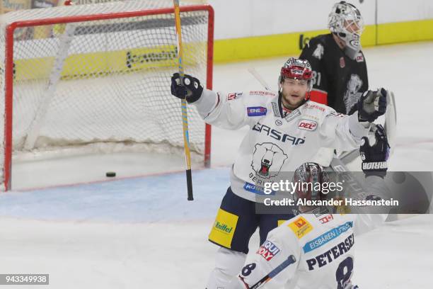 Frank Hoerdler of Eisbaeren celebrates scoring the fist team goal during the DEL Playoff semifinal match 6 between Thomas Sabo Ice Tigers Nuernberg...