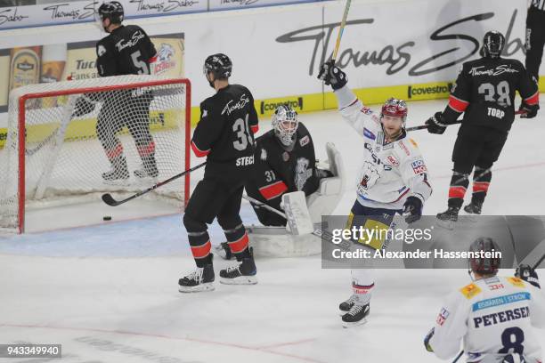 Frank Hoerdler of Eisbaeren celebrates scoring the fist team goal during the DEL Playoff semifinal match 6 between Thomas Sabo Ice Tigers Nuernberg...