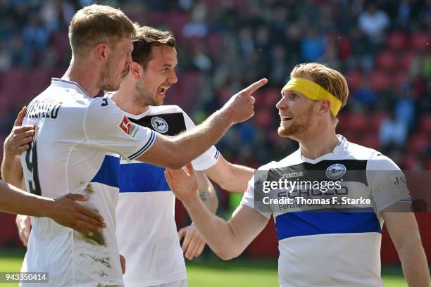 Fabian Klos, Manuel Prietl and Andreas Voglsammer of Bielefeld celebrate during the Second Bundesliga match between FC Ingolstadt 04 and DSC Arminia...