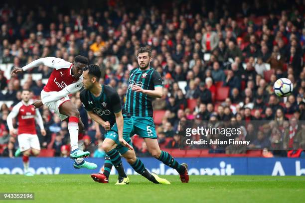 Danny Welbeck of Arsenal scores his sides second goal during the Premier League match between Arsenal and Southampton at Emirates Stadium on April 8,...