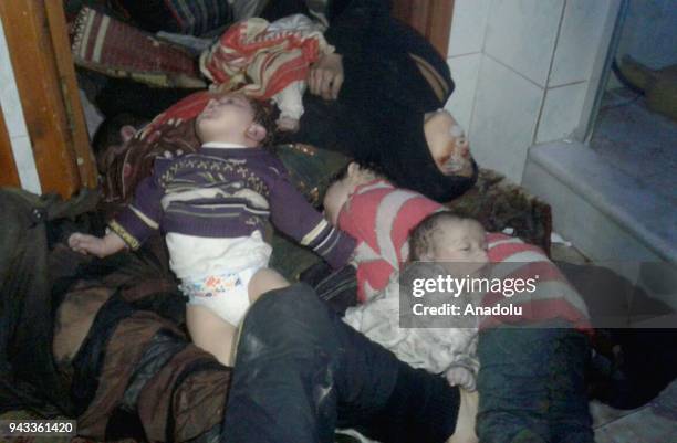 Dead bodies of Syrian people are seen after Assad regime forces allegedly conducted poisonous gas attack to Duma town of Eastern Ghouta in Damascus,...