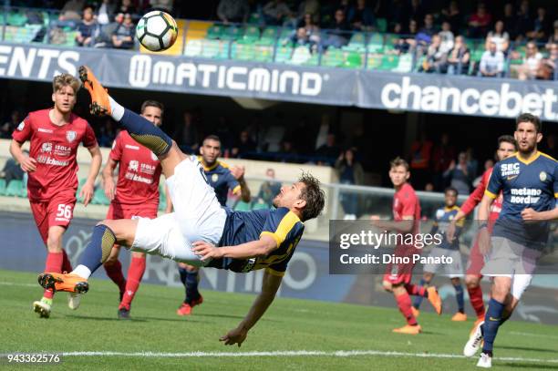 Alessio Cerci of Hellas Verona scores overhead during the serie A match between Hellas Verona FC and Cagliari Calcio at Stadio Marc'Antonio Bentegodi...