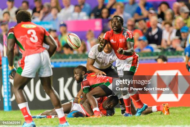 Collins Injera of Kenya passes de ball during the HSBC Hong Kong Sevens 2018 match between Fiji and Kenya on April 8, 2018 in Hong Kong, Hong Kong.