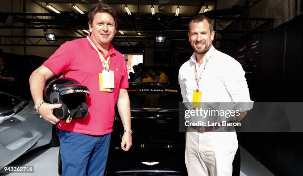 Chef and TV personality James Martin and Peter Philips prepare to be driven in an Aston Martin Vanquish S as part of F1 Hotlaps before the Bahrain...