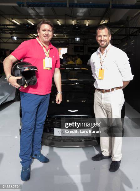 Chef and TV personality James Martin and Peter Philips prepare to be driven in an Aston Martin Vanquish S as part of F1 Hotlaps before the Bahrain...