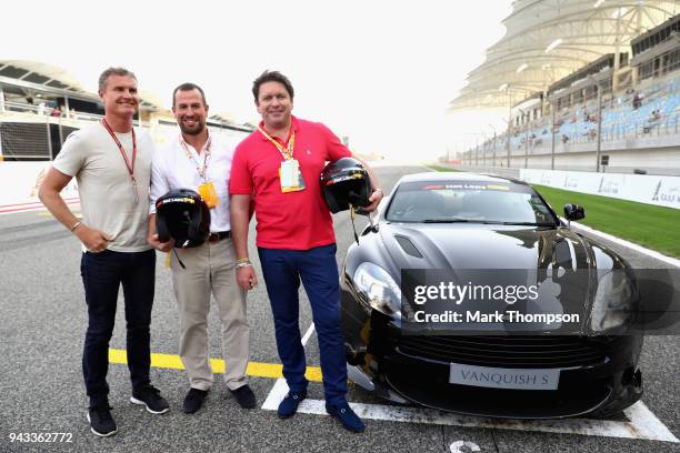 Chef and TV personality James Martin and Peter Philips prepare to be driven by David Coulthard in an Aston Martin Vanquish S as part of F1 Hotlaps...