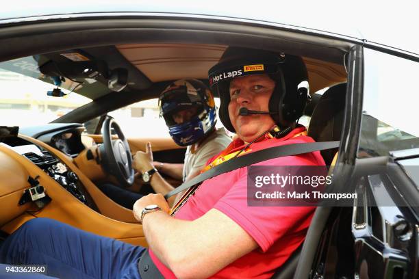 Chef and TV personality James Martin prepares to be driven by David Coulthard in an Aston Martin Vanquish S as part of F1 Hotlaps before the Bahrain...