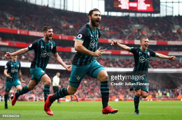 Charlie Austin of Southampton celebrates scoring his sides second goal during the Premier League match between Arsenal and Southampton at Emirates...