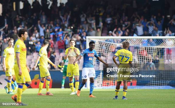 Amadou Diawara of SSC Napoli celebrates the victory, beside the disappointment of AC Chievo Verona players after the serie A match between SSC Napoli...