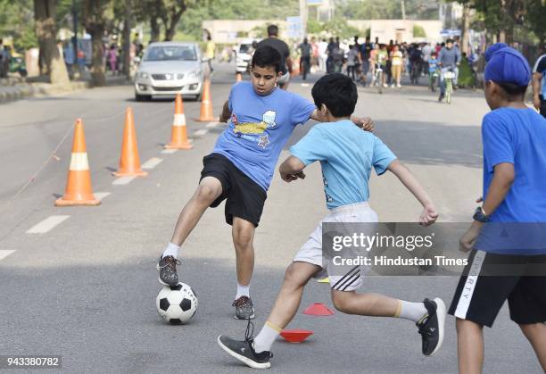 Children participate during Raahgiri day at Palam Vihar, an event organized by MCG, on April 8, 2018 in Gurugram, India. Various activities seen such...