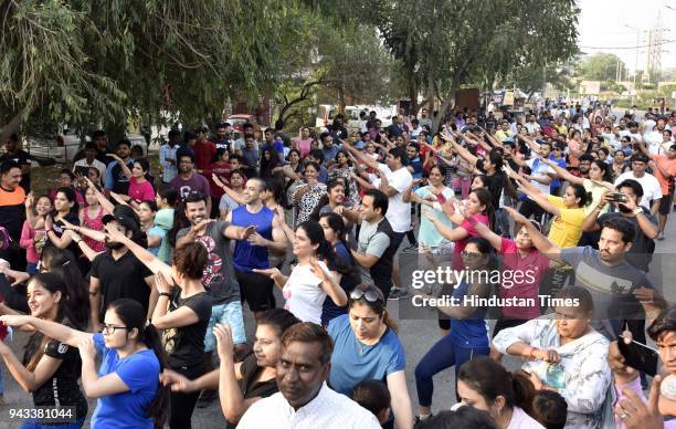 People participate during Raahgiri day at Palam Vihar, an event organized by MCG, on April 8, 2018 in Gurugram, India. Various activities seen such...