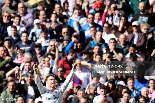 Real Madrid's Portuguese forward Cristiano Ronaldo celebrates a goal during the Spanish league football match between Real Madrid CF and Club...