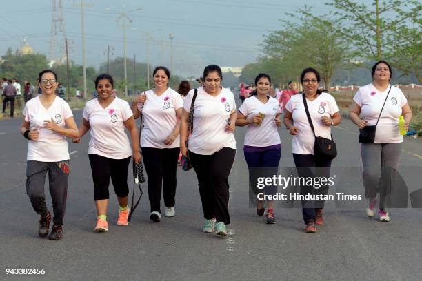 Women participate in the Pinkathon at Kharghar Central Park, on April 7, 2018 in Navi Mumbai, India. Kharghar's Central Park turned pink early on...