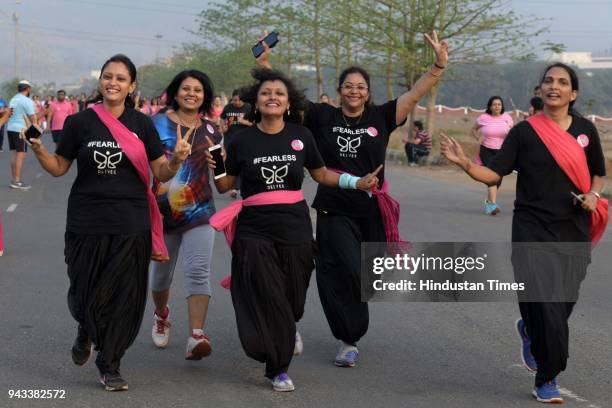 Women participate in the Pinkathon at Kharghar Central Park, on April 7, 2018 in Navi Mumbai, India. Kharghar's Central Park turned pink early on...