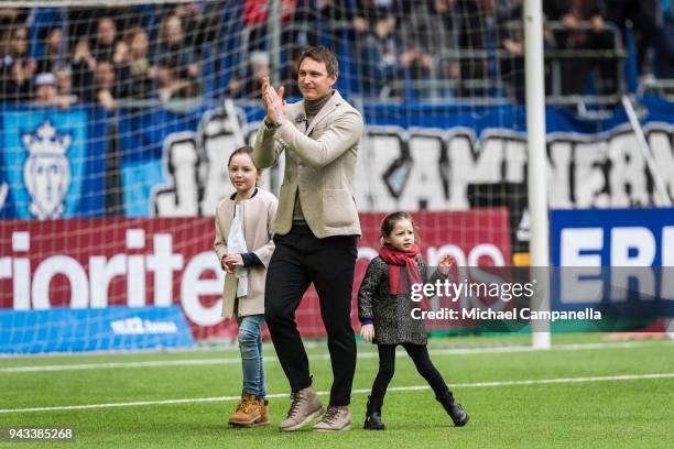 Former Djurgardens IF captain Kim Kallstrom takes a lap of honor with his daughters Zoe and Bianca before an Allsvenskan match between Djurgardens IF...