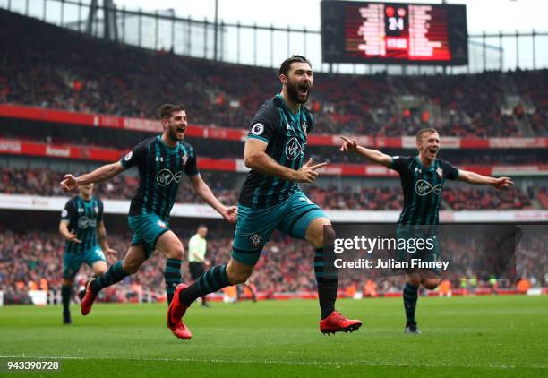 Charlie Austin of Southampton celebrates scoring their second goal during the Premier League match between Arsenal and Southampton at Emirates...