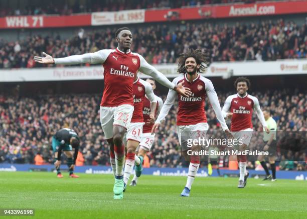 Danny Welbeck celebrates scoring the 1st Arsenal goal with Mo Elneny during the Premier League match between Arsenal and Southampton at Emirates...