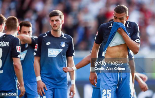 Kevin Akpoguma and team mates of Hoffenheim react during the Bundesliga match between Eintracht Frankfurt and TSG 1899 Hoffenheim at...