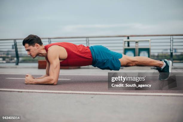 morning workout - slim man stock pictures, royalty-free photos & images