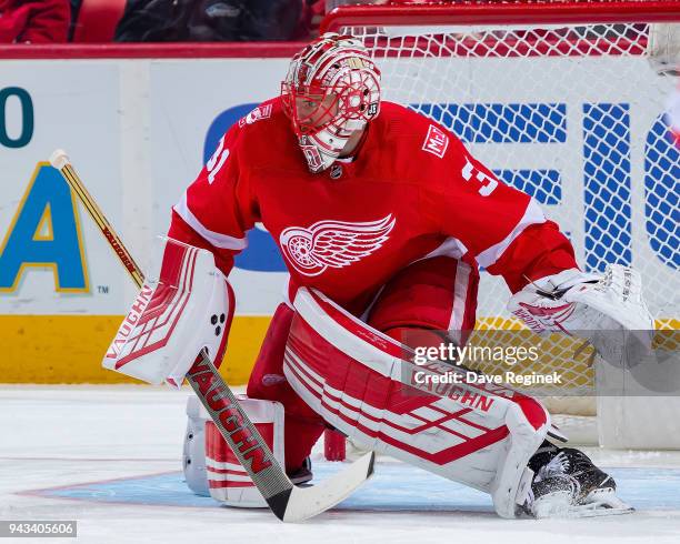 Jared Coreau of the Detroit Red Wings follows the play against the Montreal Canadiens during an NHL game at Little Caesars Arena on April 5, 2018 in...