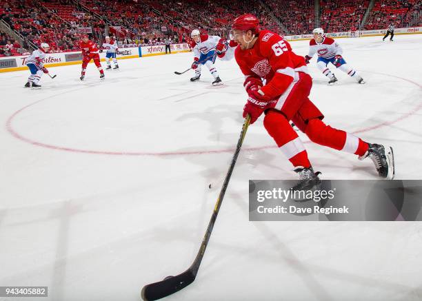 Danny DeKeyser of the Detroit Red Wings skates with the puck against the Montreal Canadiens during an NHL game at Little Caesars Arena on April 5,...