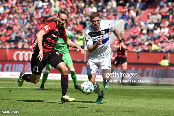 Tobias Schroeck of Ingolstadt and Fabian Klos of Bielefeld fight for the ball during the Second Bundesliga match between FC Ingolstadt 04 and DSC...