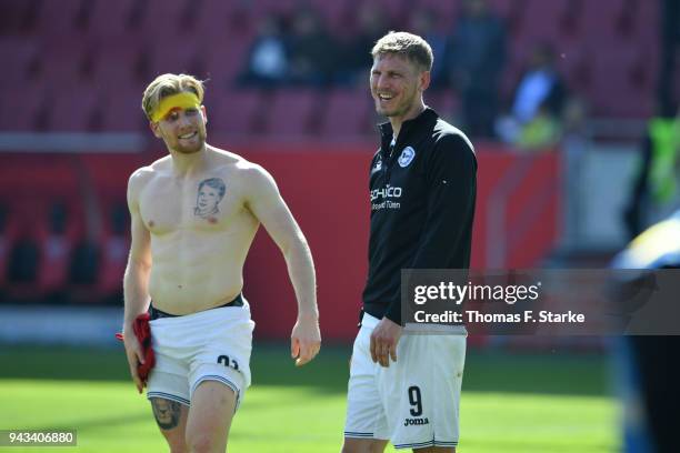 Andreas Voglsammer and Fabian Klos of Bielefeld smile after the Second Bundesliga match between FC Ingolstadt 04 and DSC Arminia Bielefeld at Audi...