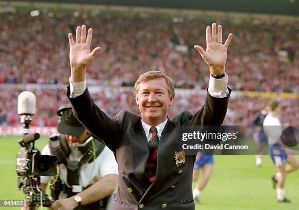 Manchester United Manager Alex Ferguson celebrates his team becoming Premier League Champions after a match against Blackburn Rovers at Old Trafford...