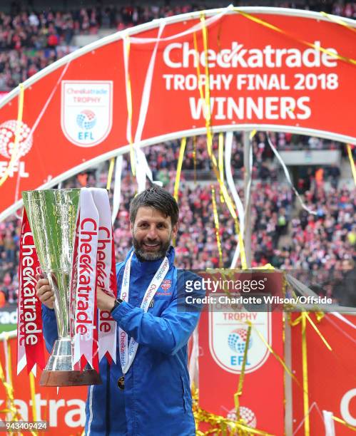 Lincoln manager Danny Cowley poses with the trophy during the Checkatrade Trophy Final between Lincoln City and Shrewsbury Town at Wembley Stadium on...