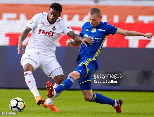 Jefferson Farfan of FC Lokomotiv Moscow and Yevgeni Makeyev of FC Rostov Rostov-on-Don vie for the ball during the Russian Football League match...