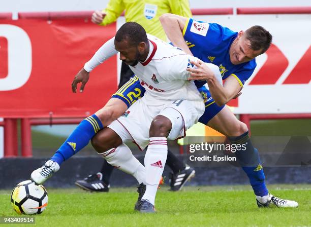 Manuel Fernandes of FC Lokomotiv Moscow and Vladimir Dyadyun of FC Rostov Rostov-on-Don vie for the ball during the Russian Football League match...