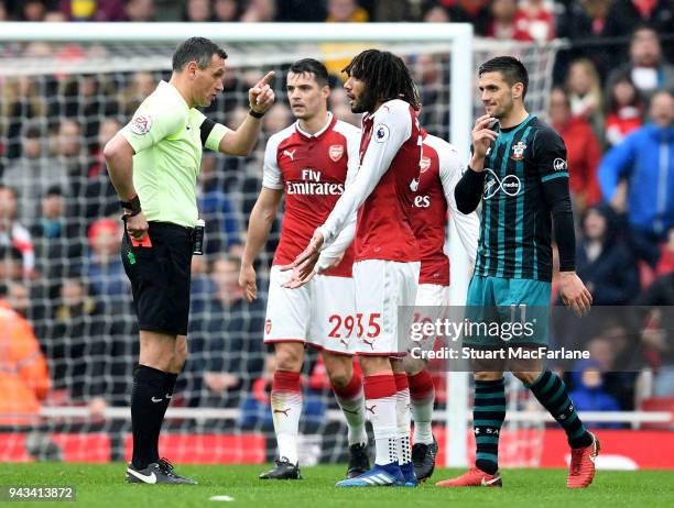 Arsenal's Mo Elneny is sent off by referee Andre Marriner during the Premier League match between Arsenal and Southampton at Emirates Stadium on...