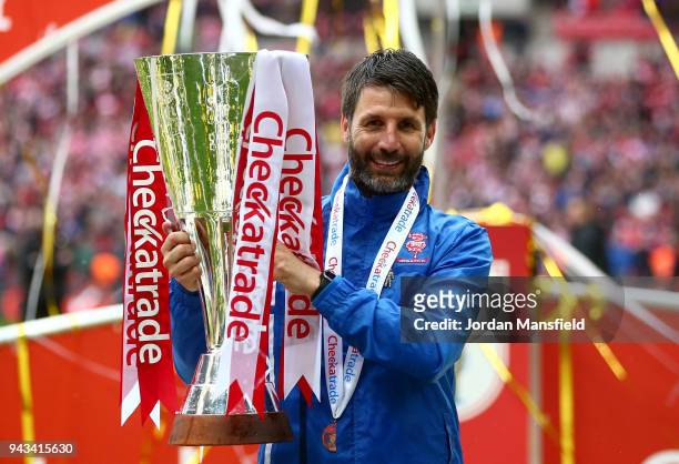 Danny Cowley, manager of Lincoln City lifts the trophy after victory during the Checkatrade Trophy Final between Shrewsbury Town and Lincoln City at...