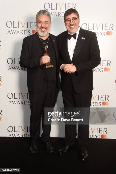 Jez Butterworth, winner of the Best New Play award for "The Ferryman", and Alfred Molina poses in the press room during The Olivier Awards with...