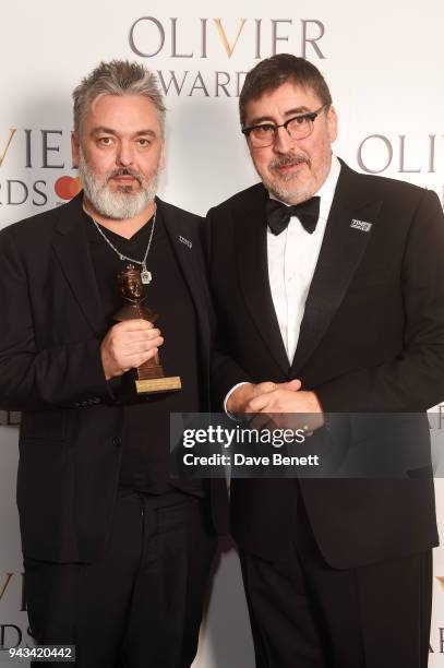 Jez Butterworth, winner of the Best New Play award for "The Ferryman", and Alfred Molina poses in the press room during The Olivier Awards with...